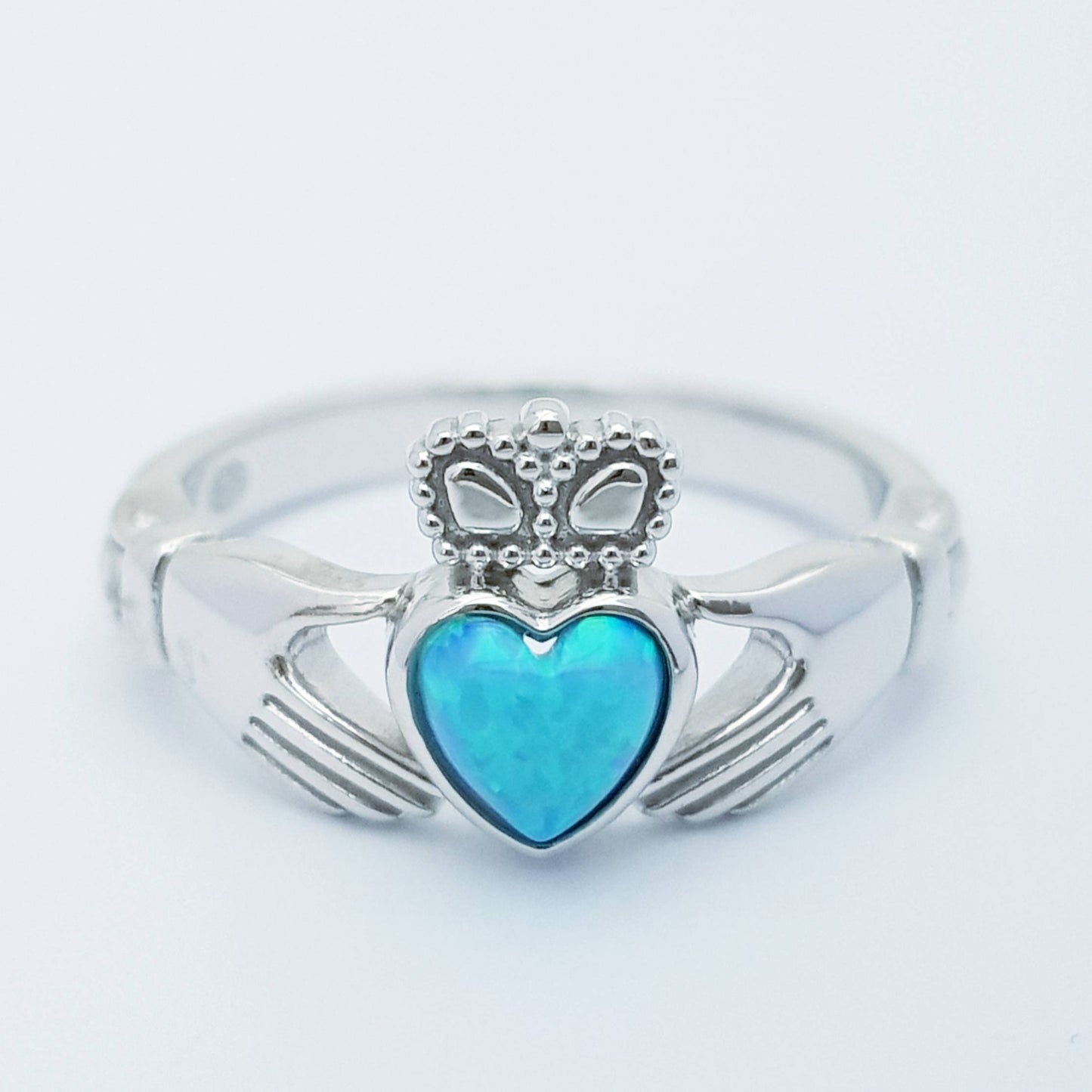 Sterling Silver Claddagh ring set with opal stone, October birthstone