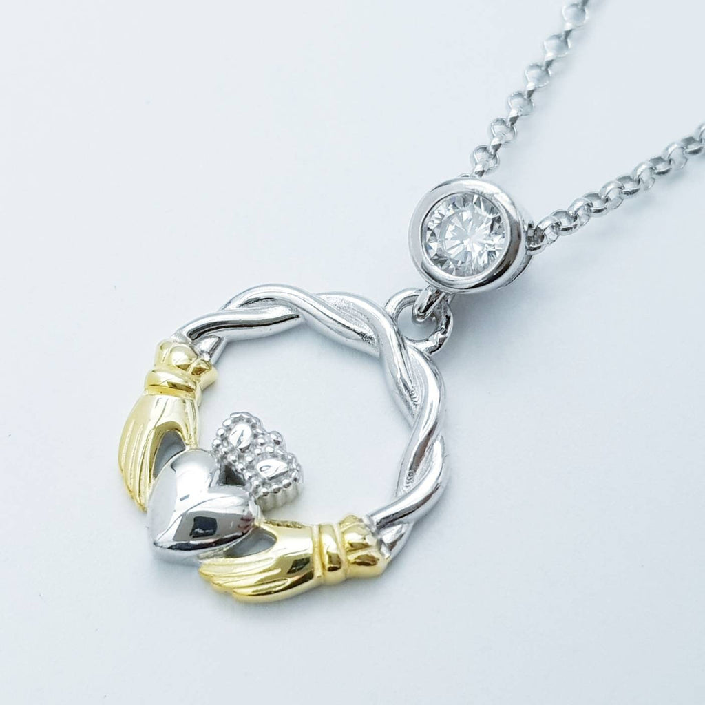 Cute Sterling Silver claddagh necklace with gold plating