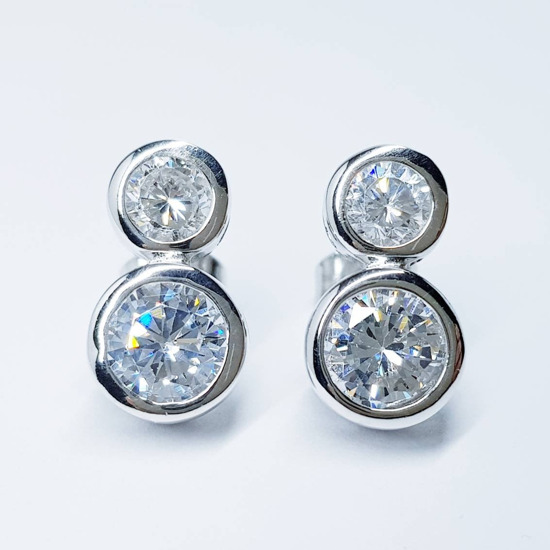 Sterling Silver stud earrings, two stone stud earrings, man made Diamond Simulant studs,
