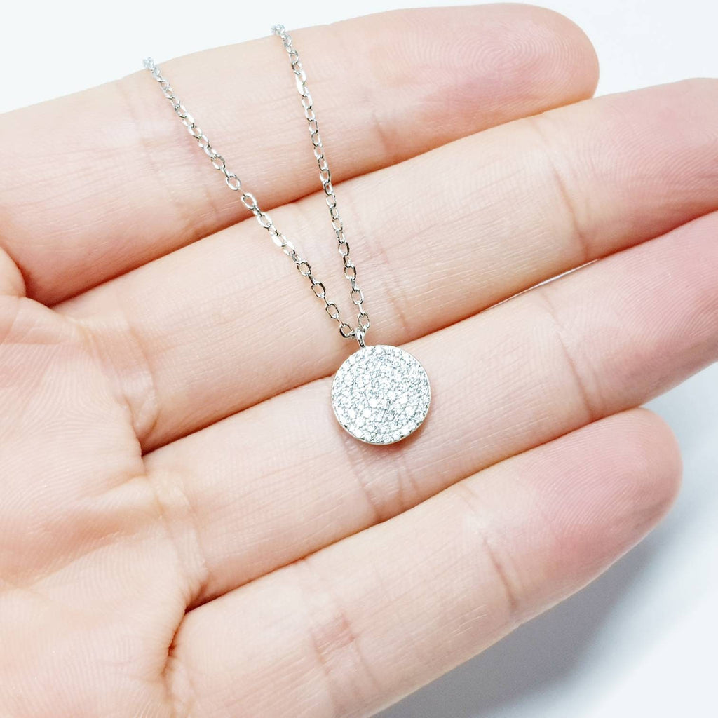 Dainty round sterling silver necklace with sparkling white cubic zirconia