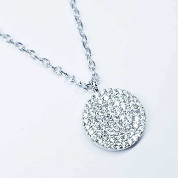 Dainty round sterling silver necklace with sparkling white cubic zirconia
