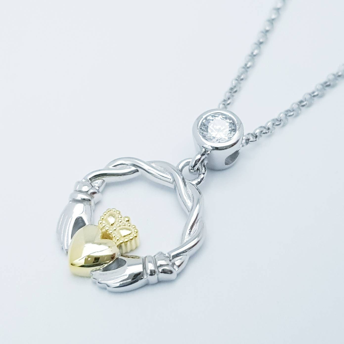 Dainty Sterling Silver claddagh necklace with gold plating