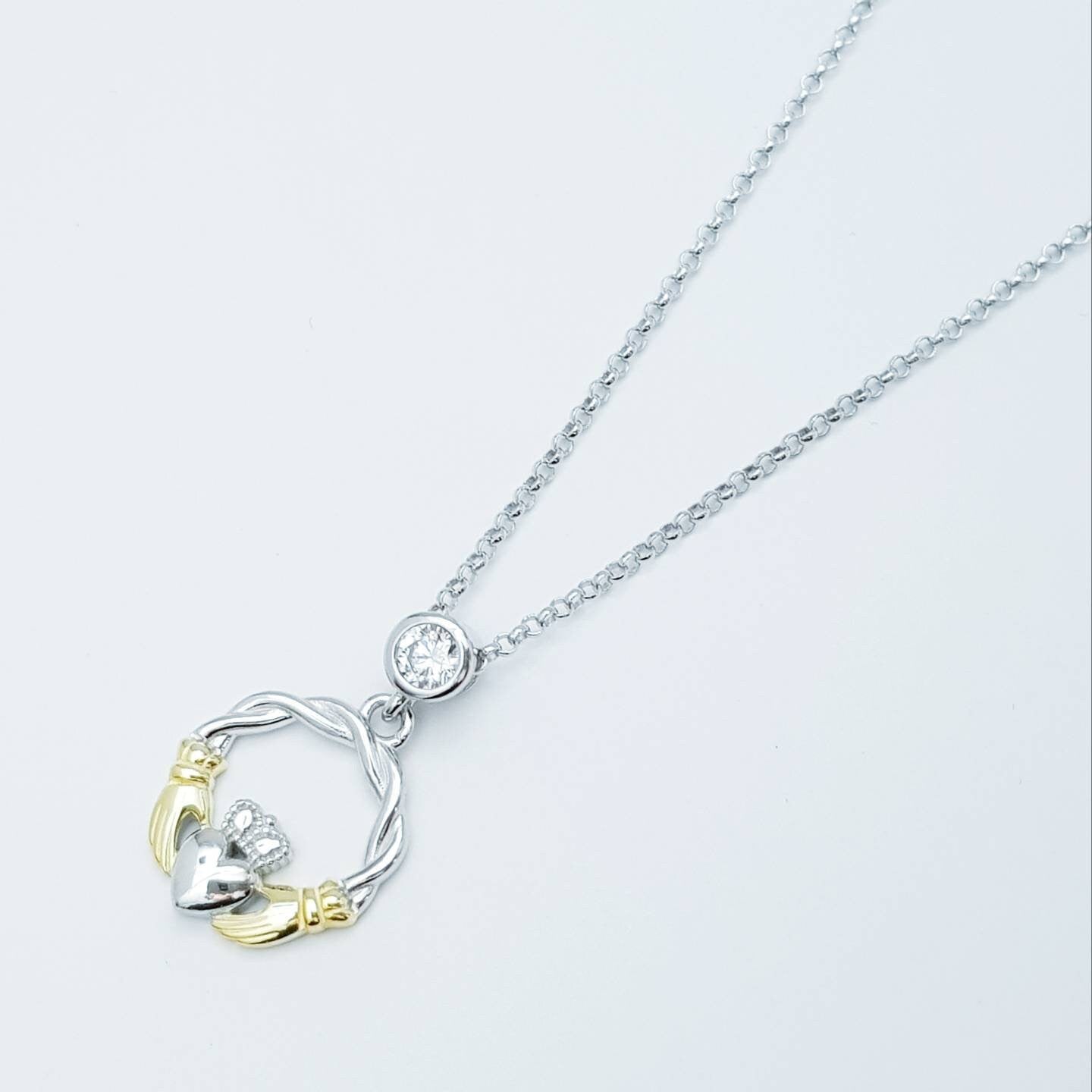 Cute Sterling Silver claddagh necklace with gold plating