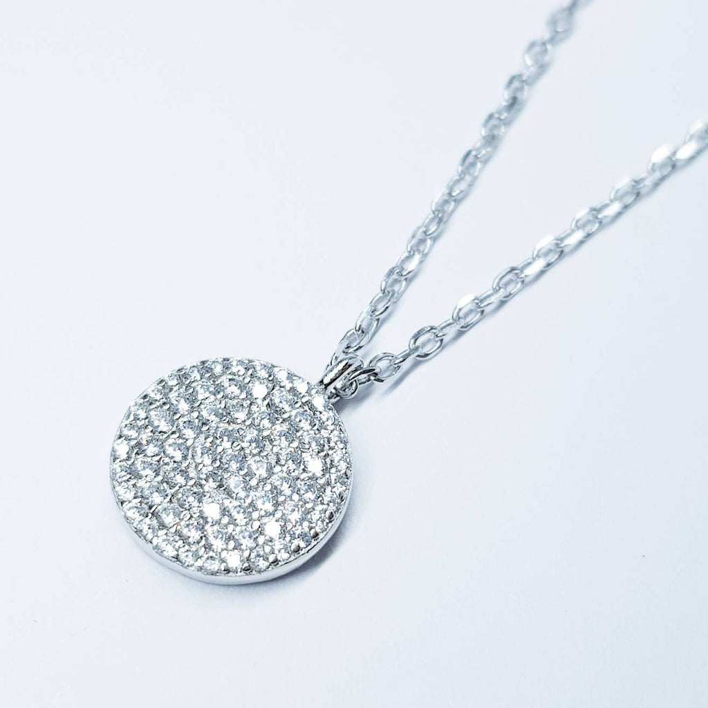 Dainty round sterling silver necklace with sparkling white cubic zirconia
