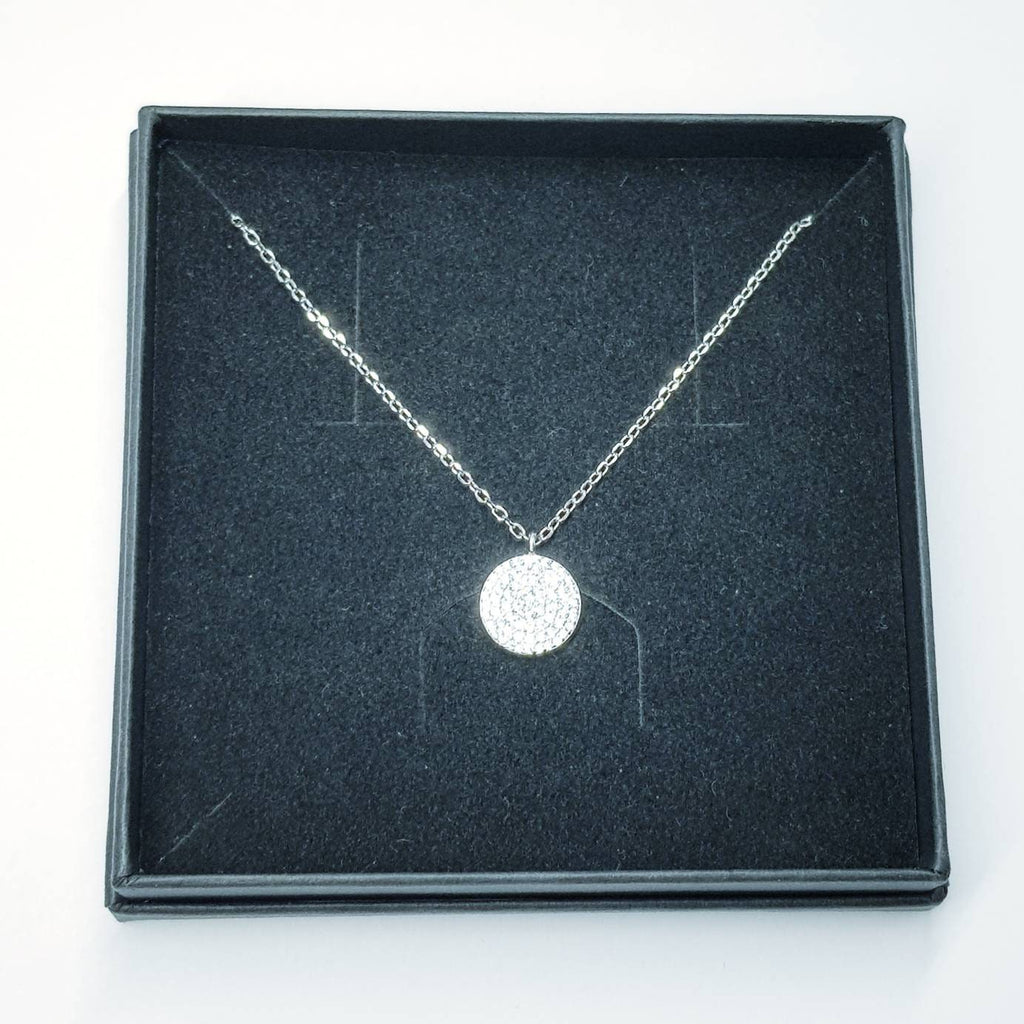 Dainty round sterling silver necklace with sparkling white cubic zirconia