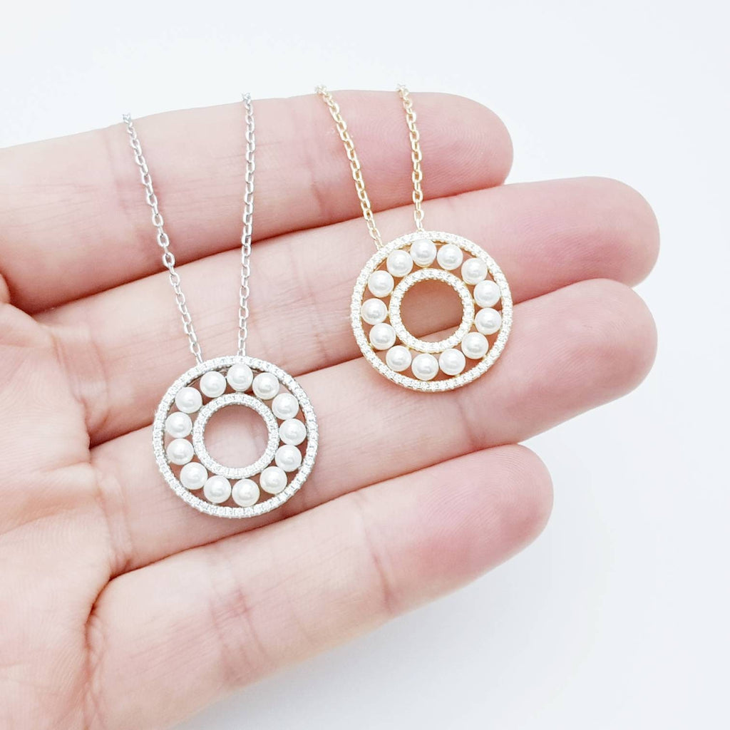 Elegant pearl pendant set in silver with sparkling white cubic zirconia, pearl circle necklace