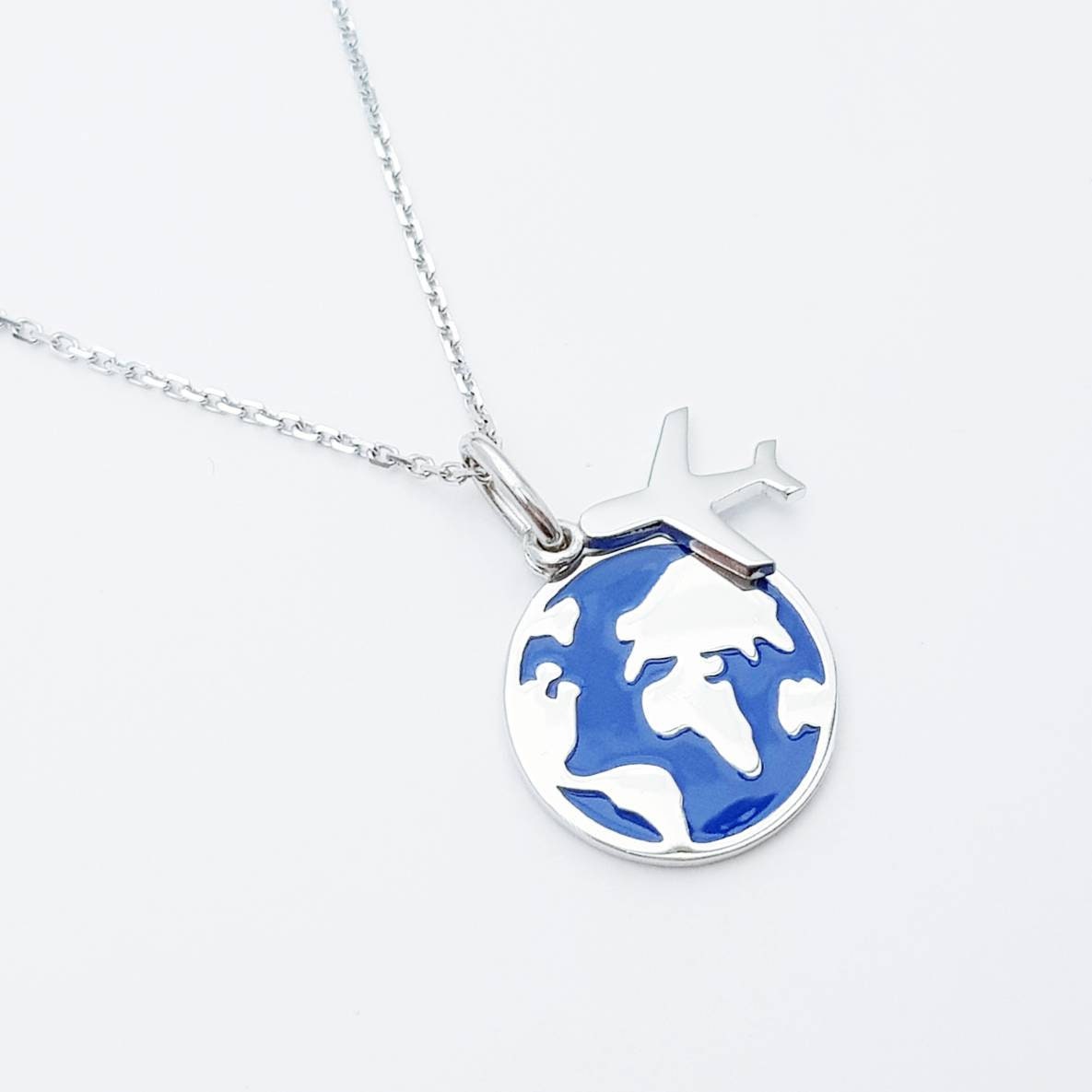 Travel pendant with enameled blue world pendant and airplane charm, Wanderlust necklace, gift for traveller