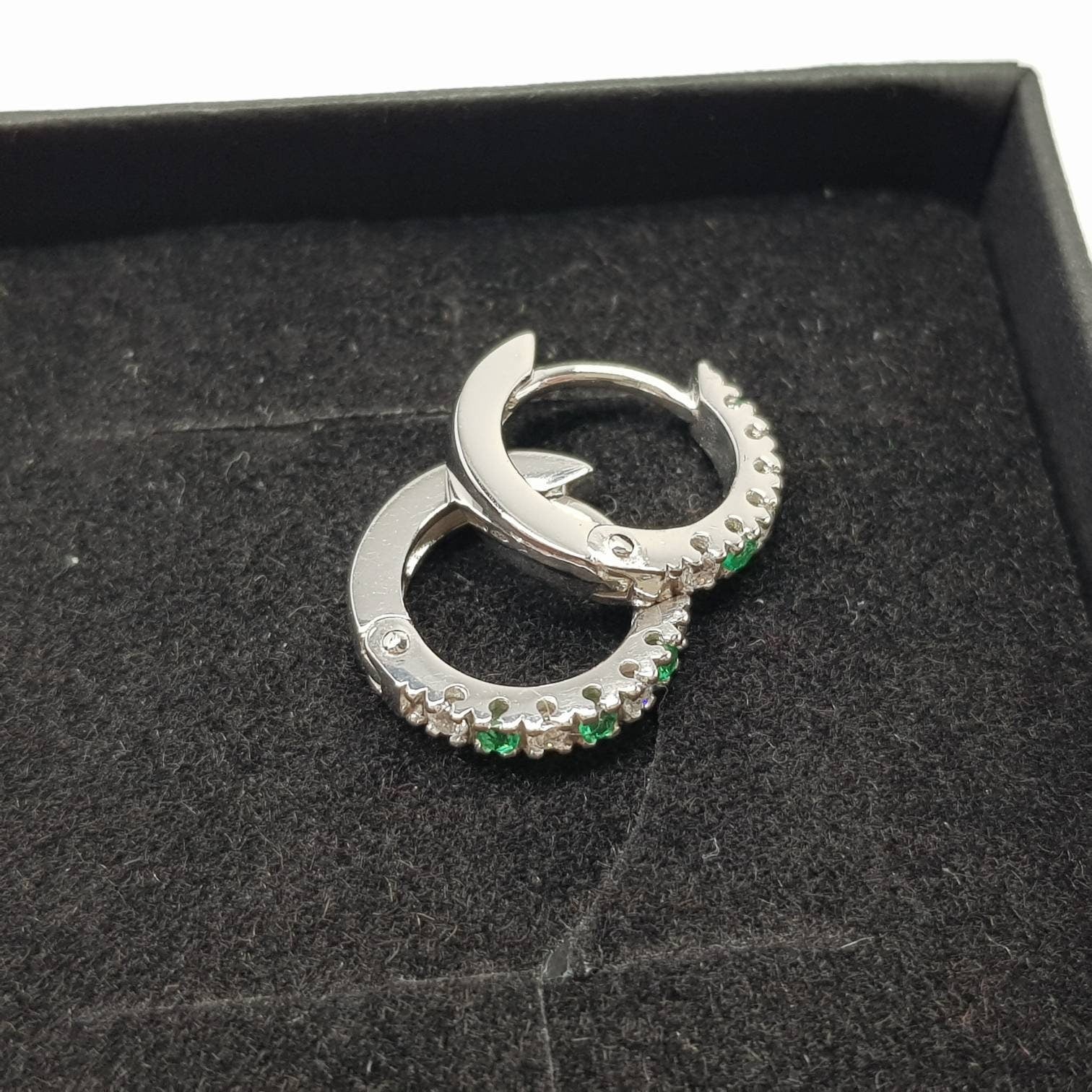 Small silver hoops with green and white CZs, mini hoop earrings, second hole huggies