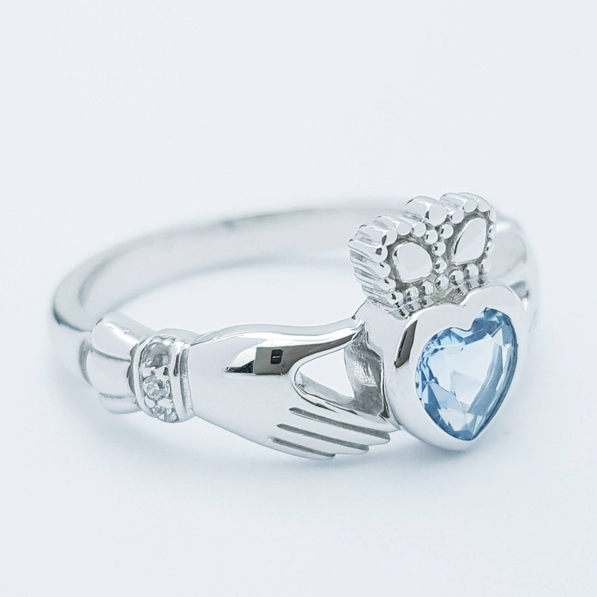 Sterling Silver Claddagh ring set with aquamarine blue heart shaped stone, Irish claddagh rings