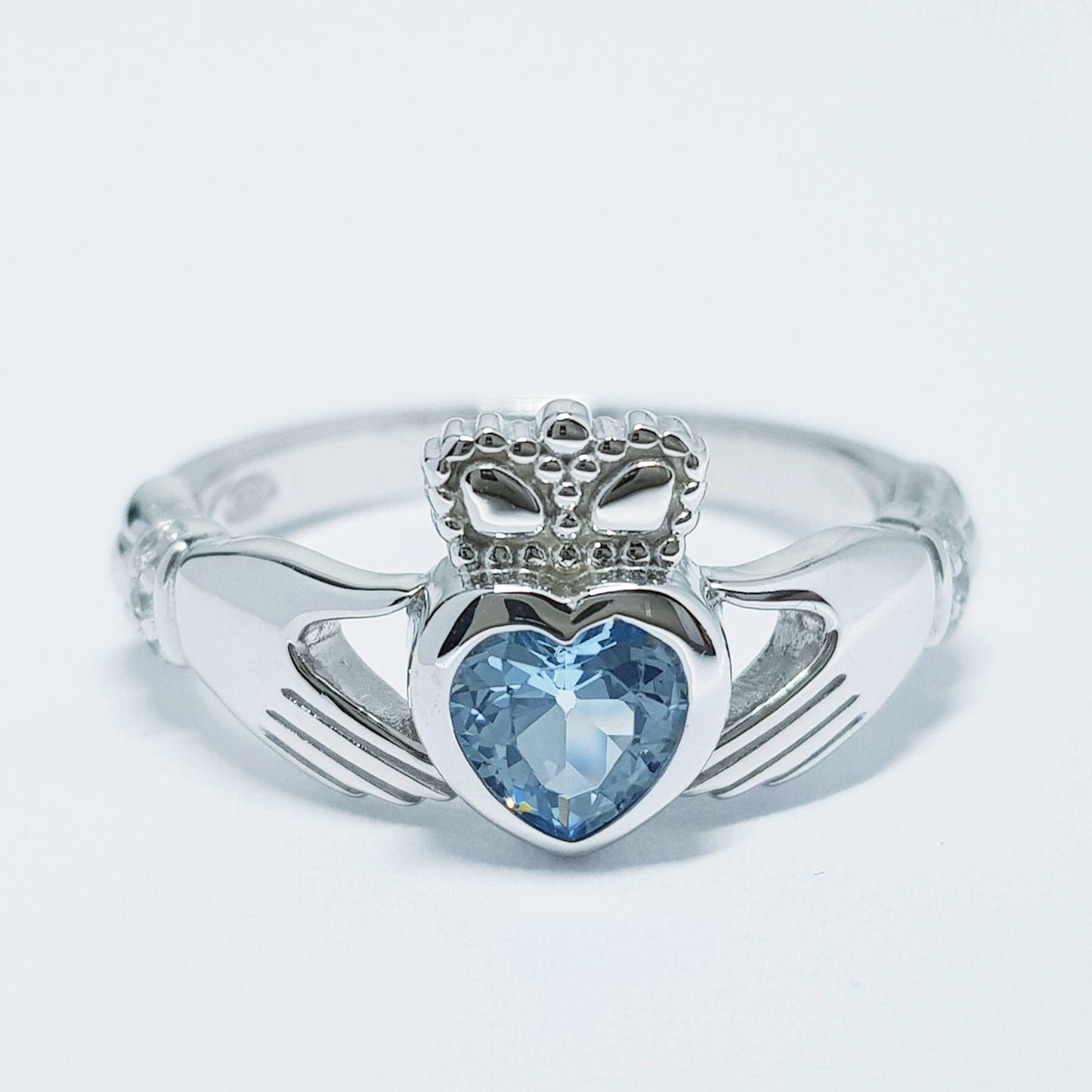 Sterling Silver Claddagh ring set with aquamarine blue heart shaped stone, Irish claddagh rings