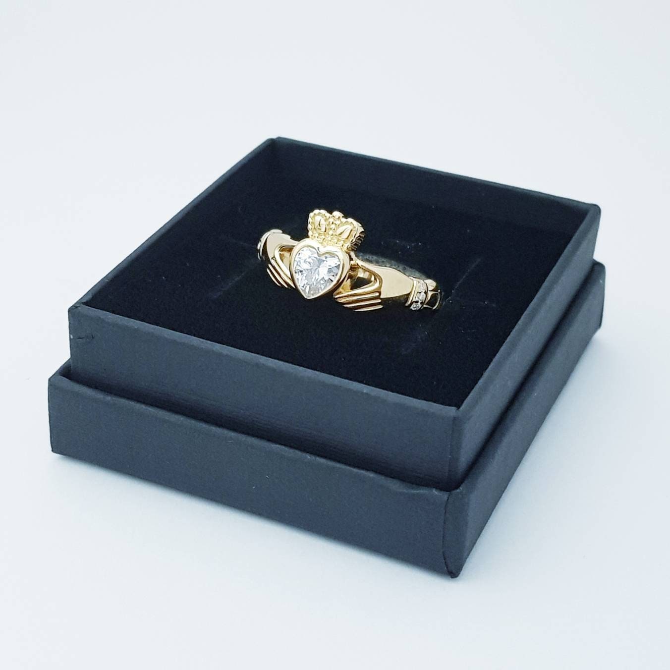 Yellow Gold plated Claddagh ring set with sparkling synthetic diamond stone